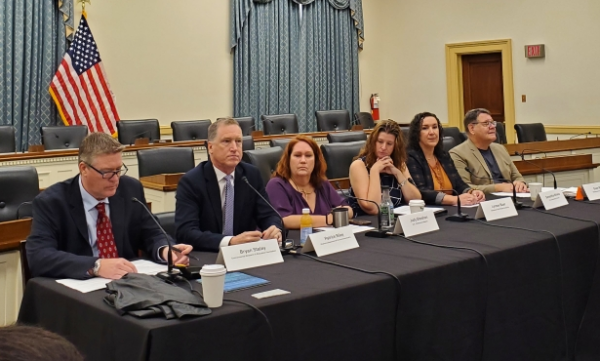 a photo of APWA Government Affairs Committee Member and Washtenaw Water Resources Commissioner Evan Pratt speaking about PFAS and the challenges of addressing contamination’s upgrades, costs, and legal risks