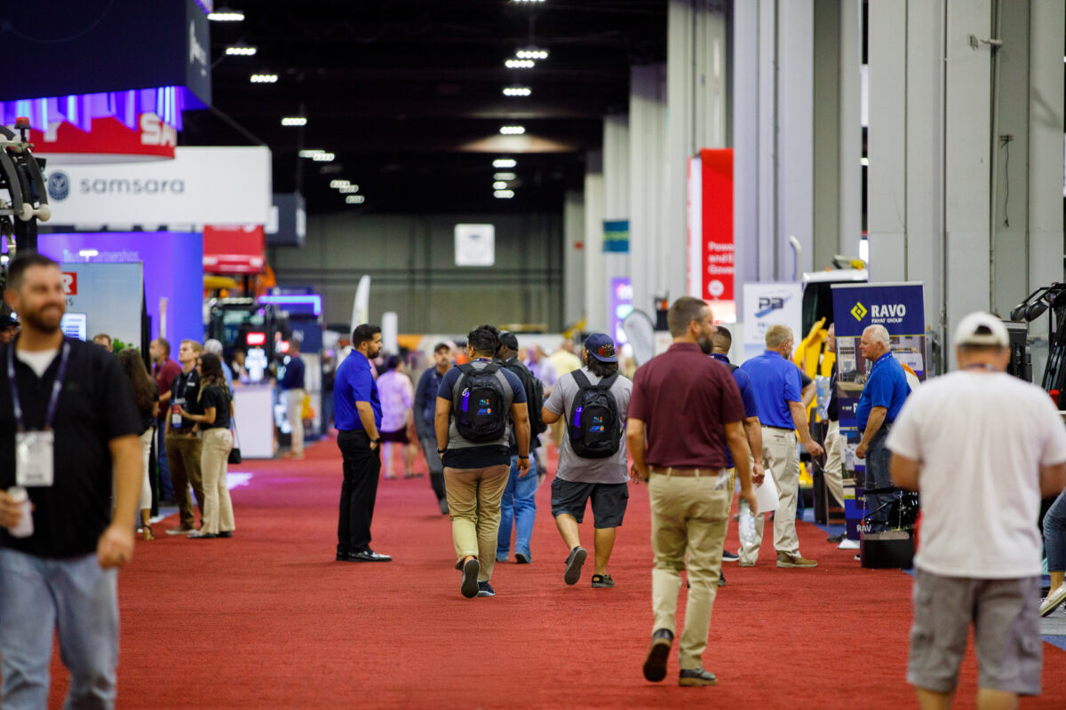 Attendees walk the exhibit floor at PWX