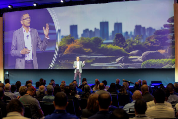 Pandit Dasa speaks at the Opening General Session at PWX 2024.
