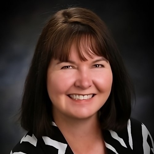 a headshot of Suzanne McCain
