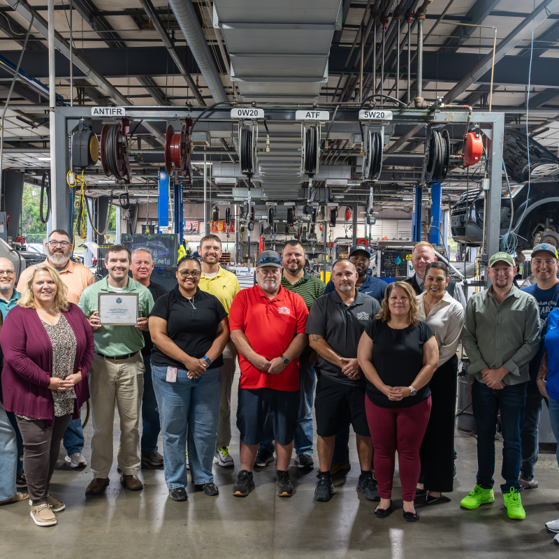 Staff from the Unified Government of Wyandotte County/Kansas City, Kansas Public Works Department smile for a photo after receiving APWA Accreditation.