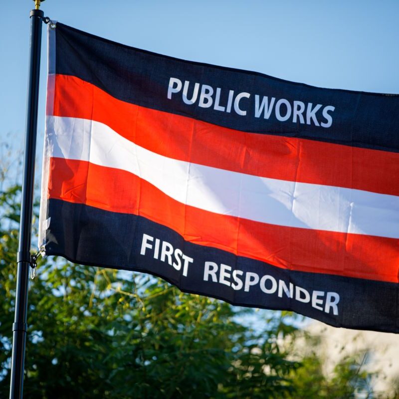 Photo of Public Works First Responder flag on a flag pole.