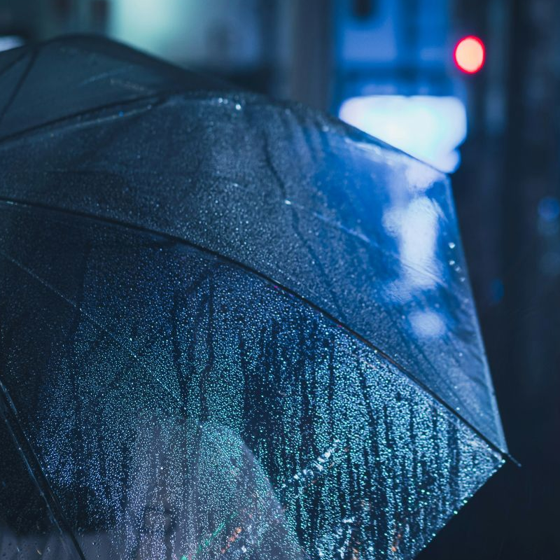 Raindrops on an umbrella.