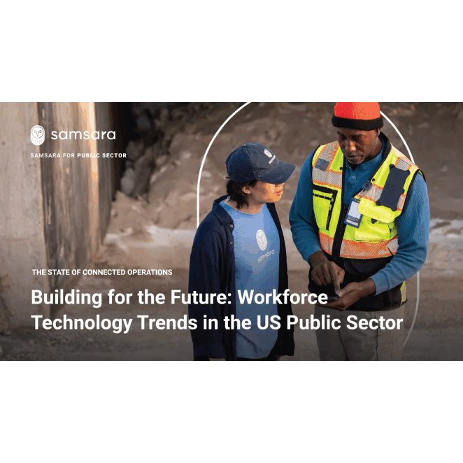 A woman in a baseball cap talks with a man in a yellow vest while the man operates a device.