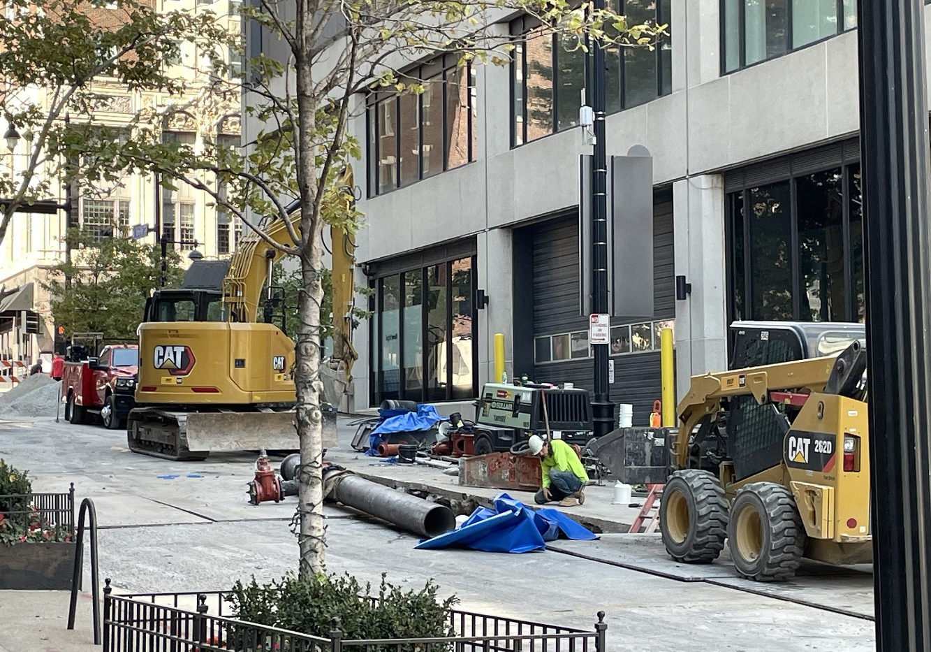 Road repairing with crane truck